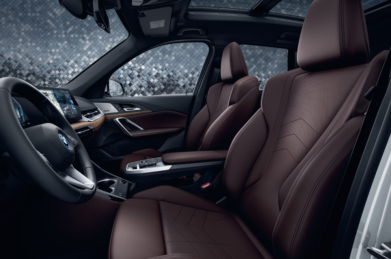 Active seats for driver and front passenger of BMW iX1 xDrive30 xLine have electrically adjustable lumbar support with massage function